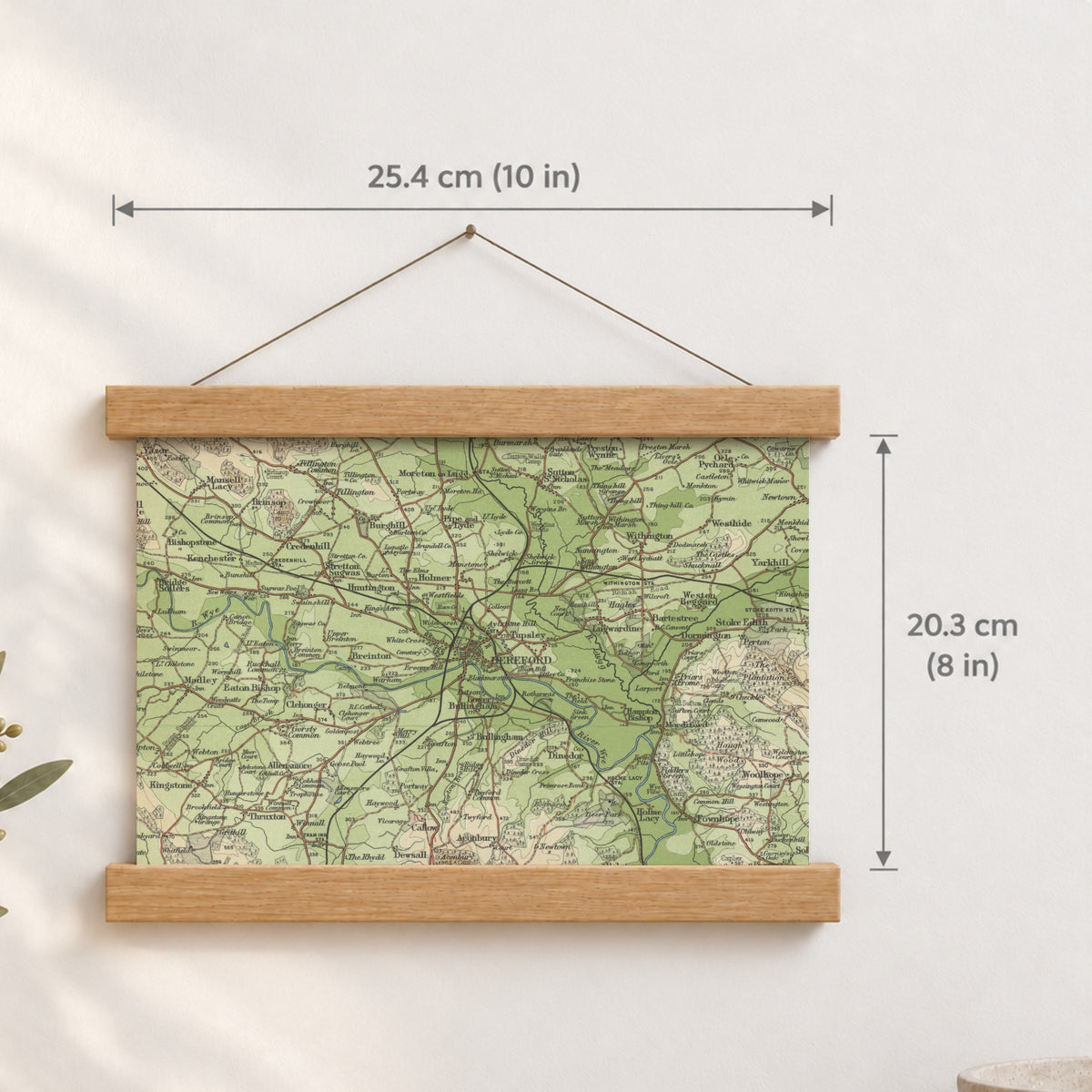 Hereford historic map print, Bartholomew Half-Inch, 1902 — 10 × 8 in · landscape, Canvas, black hanger and Canvas, natural oak hanger and Canvas, white hanger and Fine art paper, black hanger and Fine art paper, natural oak hanger and Fine art paper, no hanger and Fine art paper, white hanger, hanger front mockup