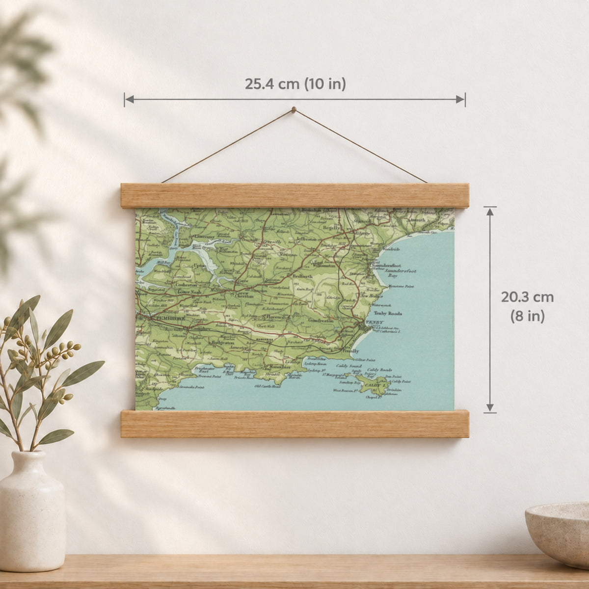 Tenby historic map print, Bartholomew Half-Inch, 1903 — 10 × 8 in · landscape, Canvas, black hanger and Canvas, natural oak hanger and Canvas, white hanger and Fine art paper, black hanger and Fine art paper, natural oak hanger and Fine art paper, no hanger and Fine art paper, white hanger, hanger front mockup