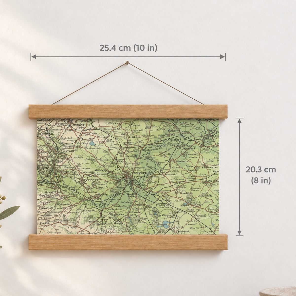 Wakefield historic map print, Bartholomew Half-Inch, 1904 — 10 × 8 in · landscape, Canvas, black hanger and Canvas, natural oak hanger and Canvas, white hanger and Fine art paper, black hanger and Fine art paper, natural oak hanger and Fine art paper, no hanger and Fine art paper, white hanger, hanger front mockup