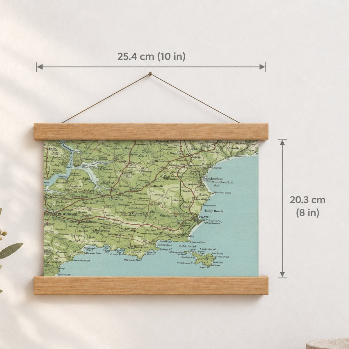 Tenby historic map print, Bartholomew Half-Inch, 1903 — 10 × 8 in · landscape, Canvas, black hanger and Canvas, natural oak hanger and Canvas, white hanger and Fine art paper, black hanger and Fine art paper, natural oak hanger and Fine art paper, no hanger and Fine art paper, white hanger, hanger front mockup